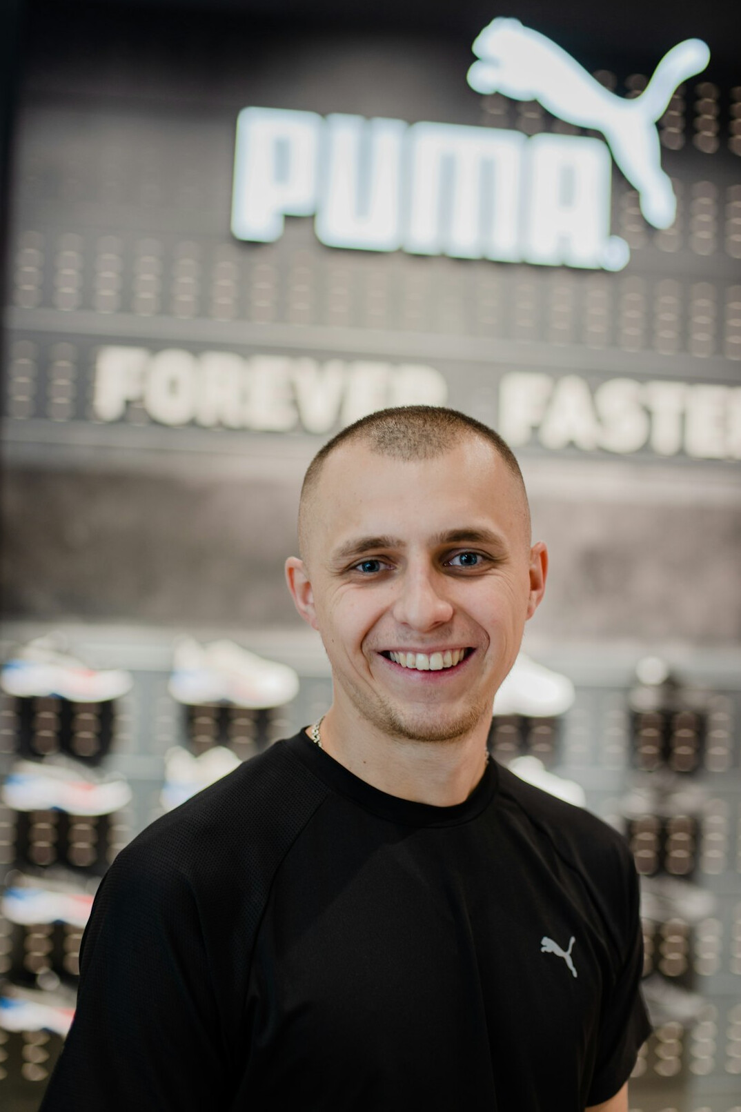 Studio portrait of a European man trainer smiling