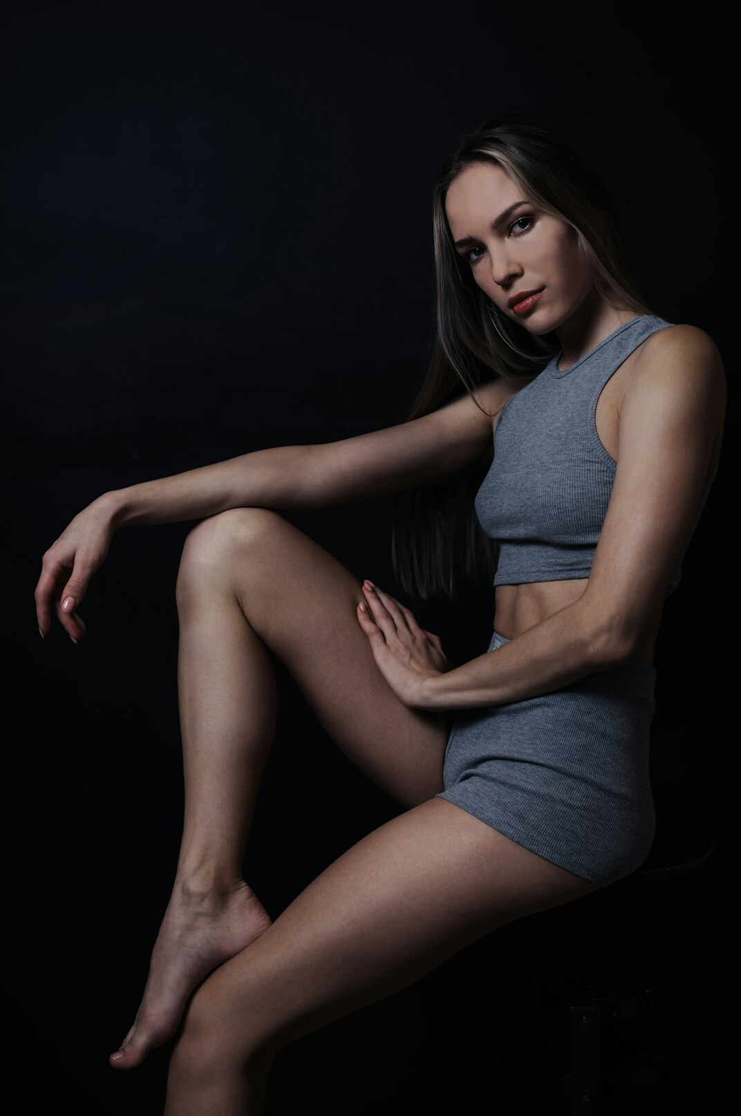 Studio portrait of a young European woman coach